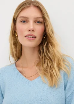 Suave jersey de punto fino con mangas abullonadas Mujer Básicos|Jerséis