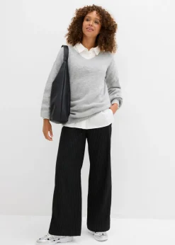 Suave jersey de punto fino con mangas abullonadas Mujer Básicos|Jerséis
