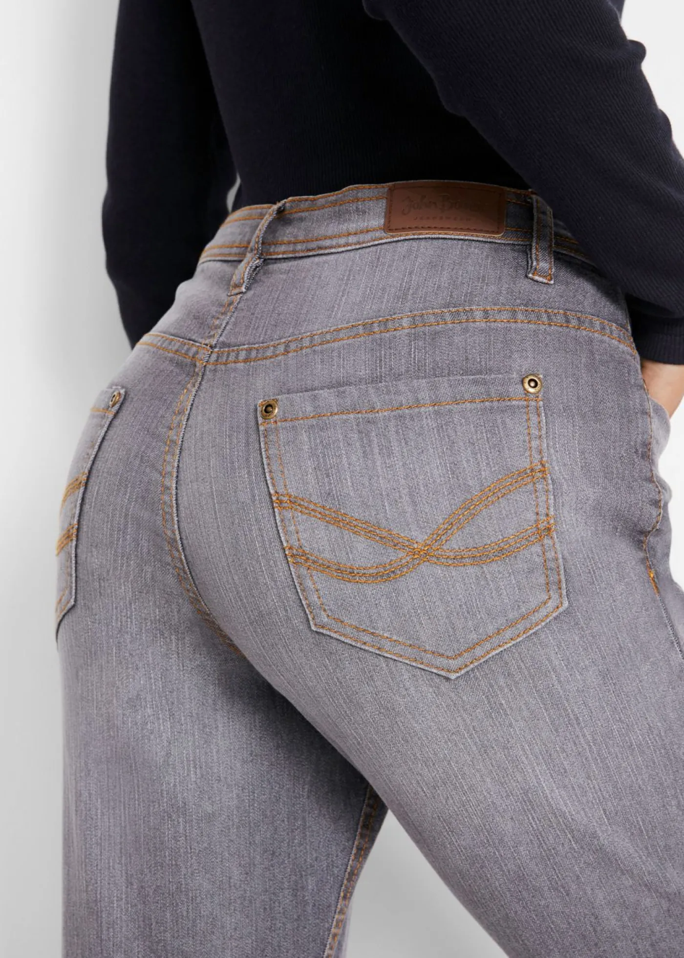 Vaqueros elásticos con corte mom y talle medio Mujer Vaqueros